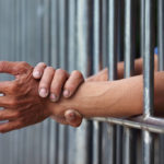 hands in prison